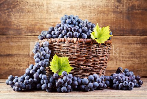 grape in wooden basket 