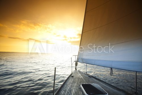 Sailing and sunset sky