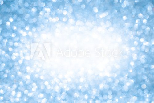 Blue bokeh christmas winter background with copy space