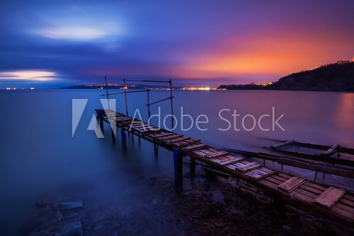 Long time exposure landscape with lake after sunset