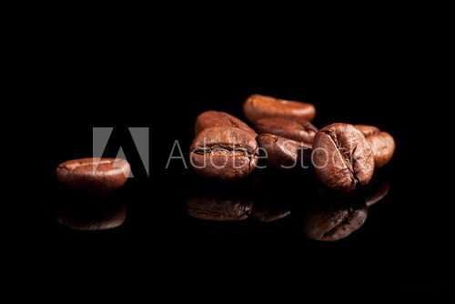 Luxurious coffee beans on black.