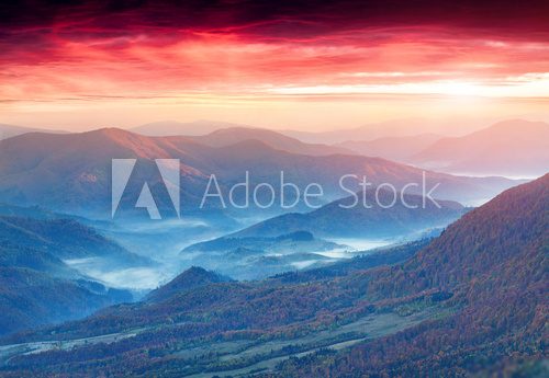 Panorama of the autumn mountains. Foggy mogning. 
