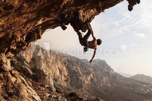 Rock climber at sunset, Kalymnos Island, Greece 