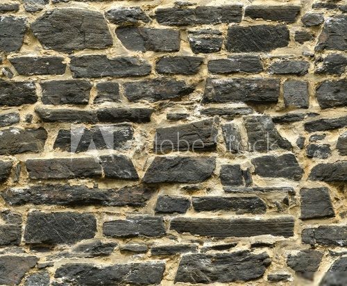 seamless black ashlar old stone wall texture