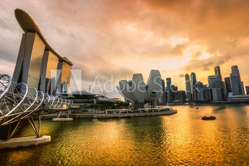 Singapore city skyline at sunset. 