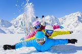 Ski, sun and fun - family enjoying winter holiday 
