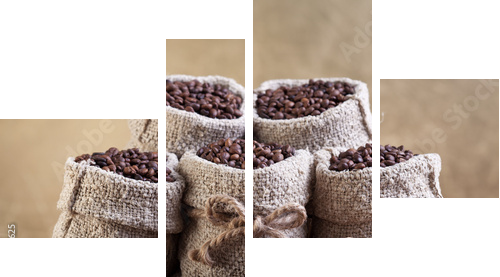 Roasted coffee beans in small burlap bags  - Vierteiliges Leinwandbild, Viertychon