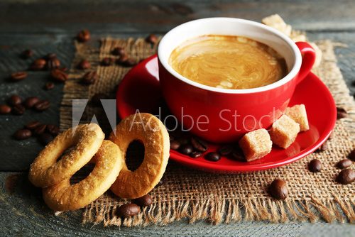 Cup of coffee and tasty cookies 