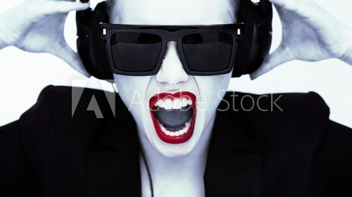 Dramatic portrait of a woman in headphones 