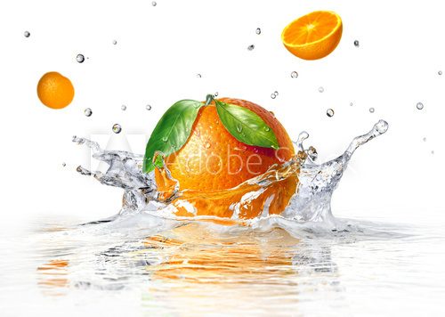 orange splashing into clear water