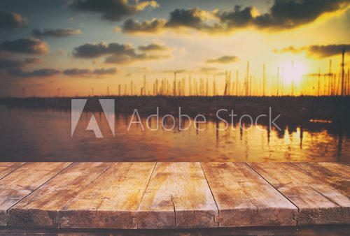 table in front of abstract blurred background of marine