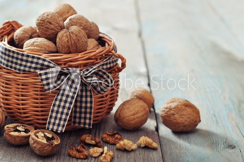 Walnuts in wicker basket 