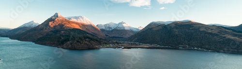 Aerial View of Glencoe and the Mountains Surrounding The Small Town in Scotland