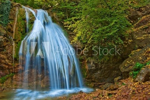 beautiful waterfall in a mountains 