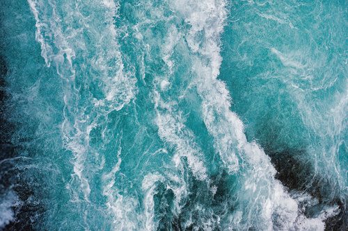 Bruarfoss waterfall in Iceland as an abstract of the blue water and whitewater from above