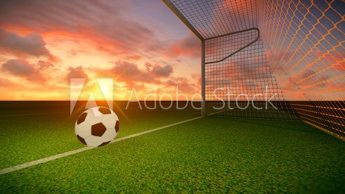 Dramatischer Sonnenuntergang am Fußballtor
