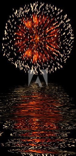 Explosive fireworks shooting into the black sky and reflections 