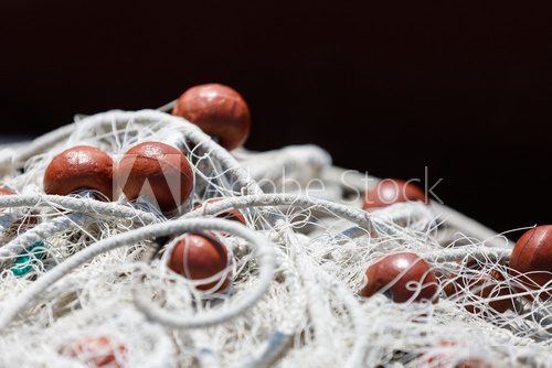 Fishing net with red floats background