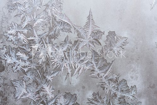 Ice patterns on winter glass 