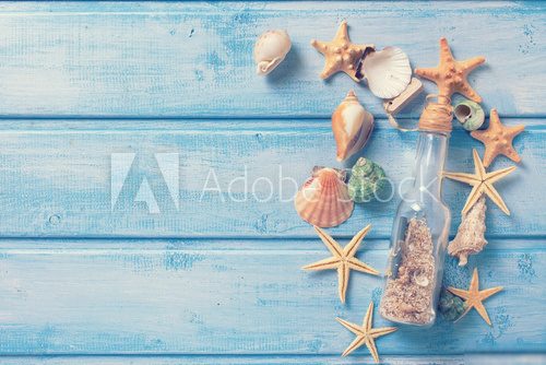 Marine items on blue wooden background