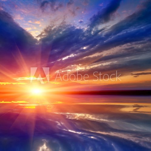 Nice landscape with sunset over water