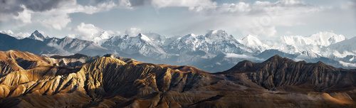 Panoramic view of snow mountains range landscape