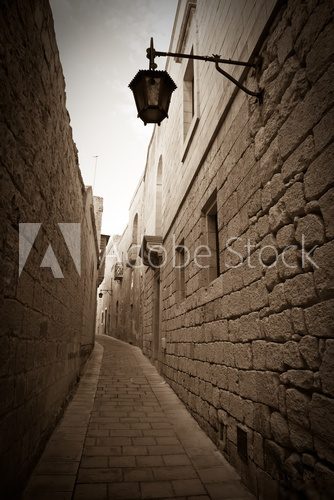 Retro photo of  narrow town street