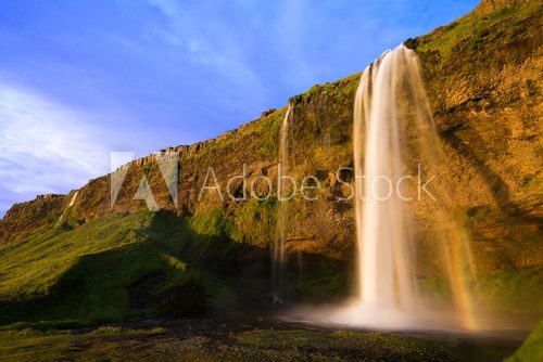 Seljalandfoss waterfall at sunset, Iceland 