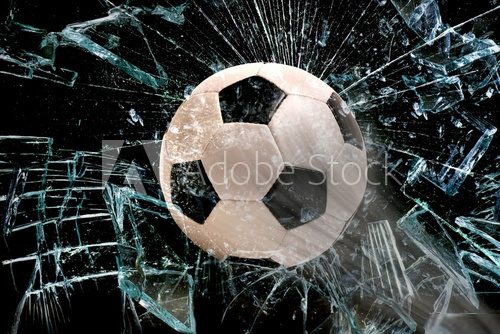 Soccer ball through glass. 