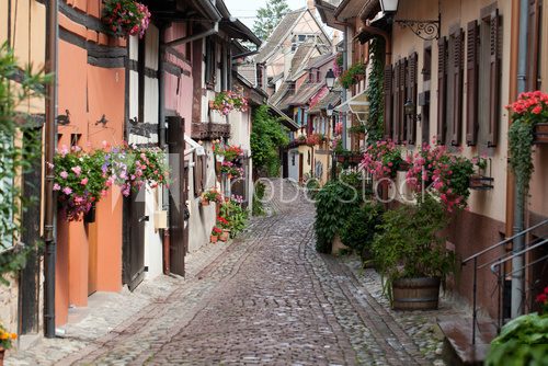 Street with half-timbered medieval houses in Eguisheim 