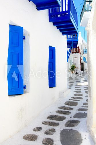 white washed narrow street in Mykonos island