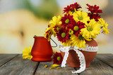 Beautiful chrysanthemum in pot with candlestick 
