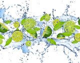 Fresh limes in water splash,isolated on white background