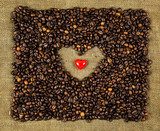 Little heart on coffee beans