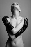 nude elegant girl with the gloves Studio fashion photo