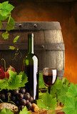 Red wine, grapevine and cask