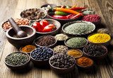Spices on wooden bowl background  