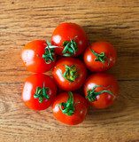 tomatoes on a wooden background 