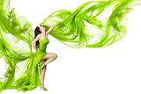 Woman dancing in green dress, fluttering waving fabric 