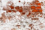 abandoned painted brick wall