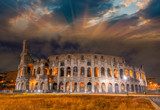 Beautiful sunset sky colors over Colosseum in Rome. Roma - Colos 