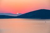 Colorful sunrise over sea in Greece