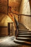 Decaying staircase in an abandoned central office 