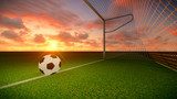 Dramatischer Sonnenuntergang am Fußballtor