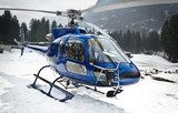 helicopter resting on the snow - front 