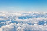 horizon above white clouds in blue sky 