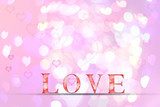 Love word  on blur bokeh background for valentine'