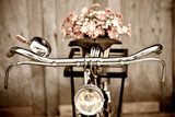 Old bicycle and flower  vase 