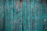 Old teal colored wooden wall