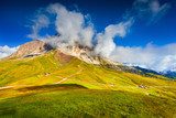 Sassolungo mountain range at sunny summer day.  Dolomites mounta 